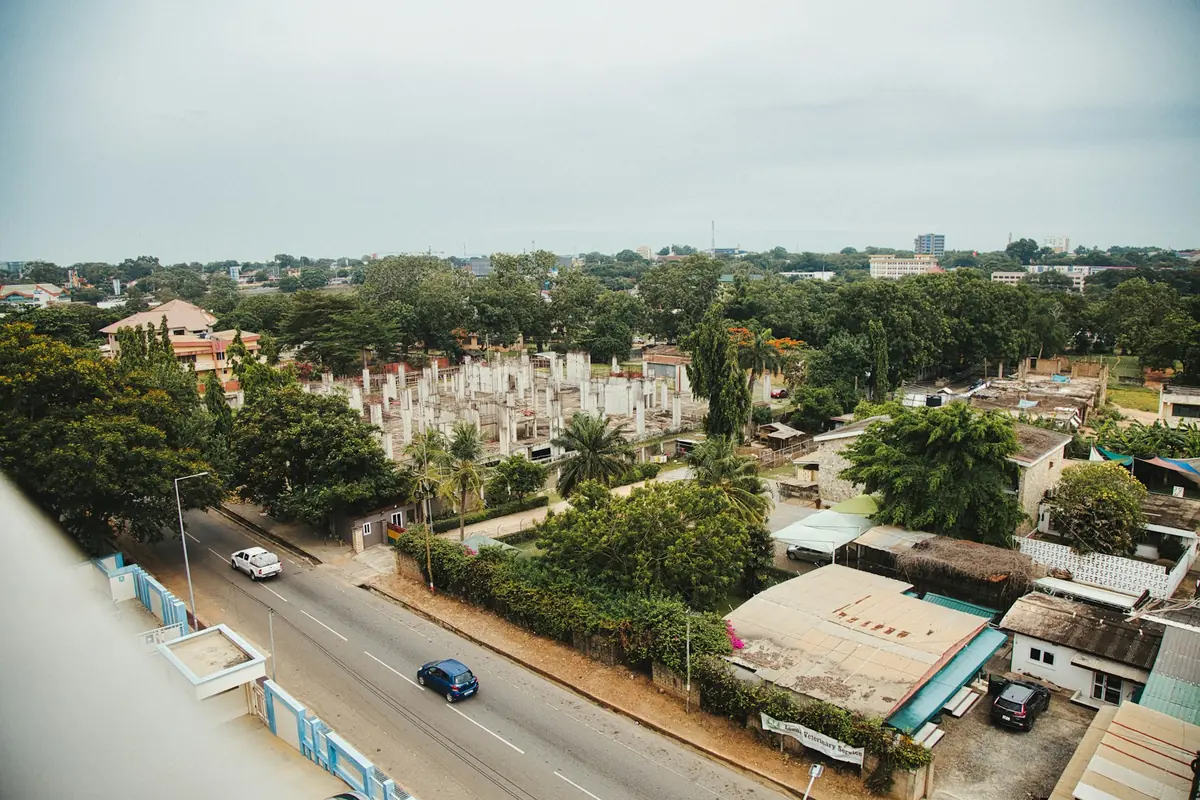 Tree-lined road in Greater Accra seen from above