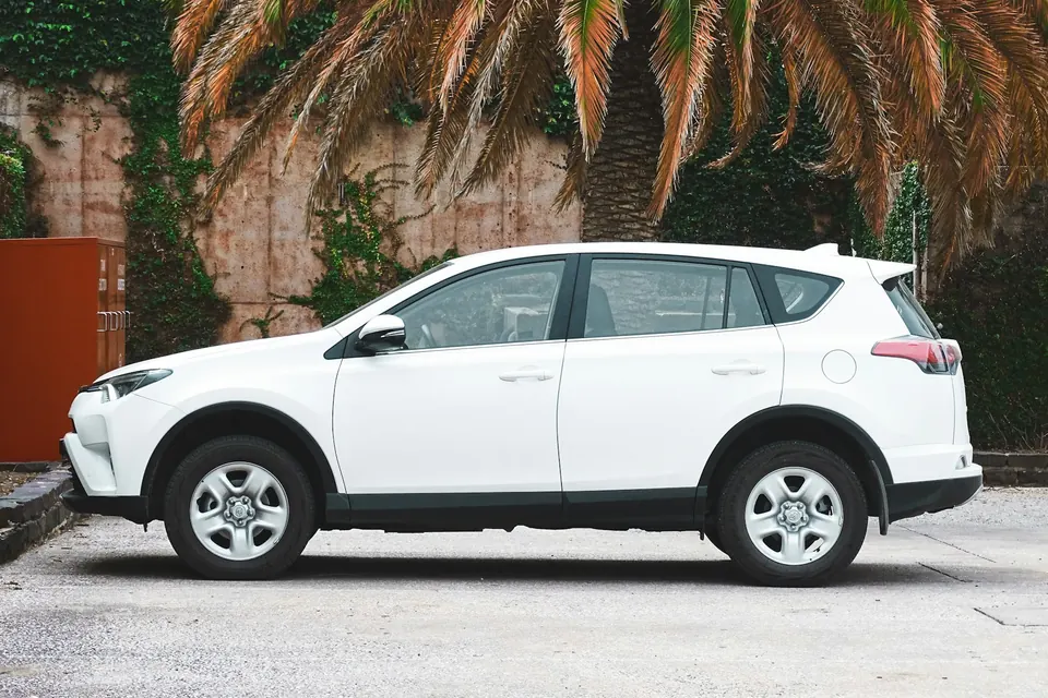 White Toyota RAV4 SUV for rent in Ghana